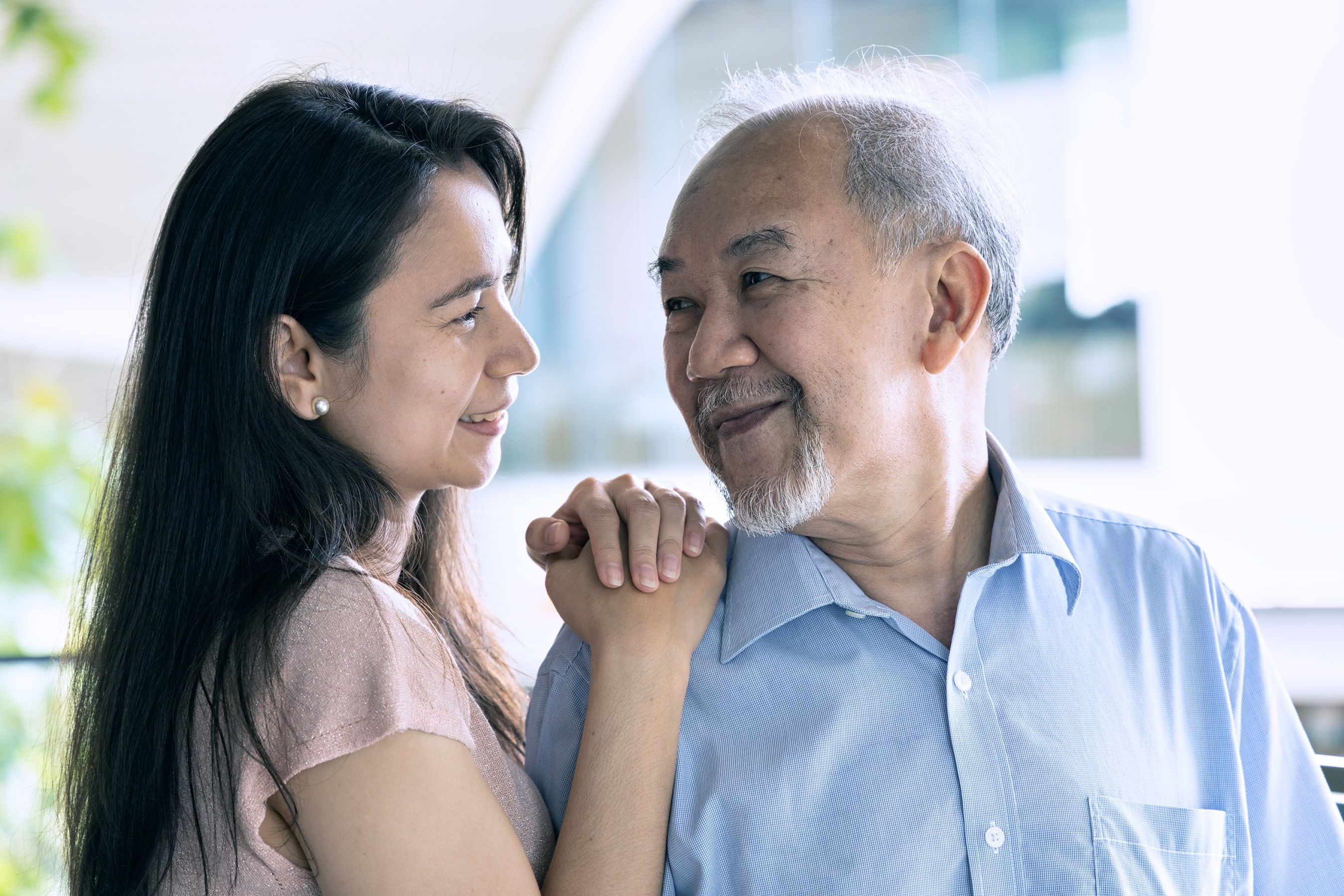 Caregiver and older adult spending time together